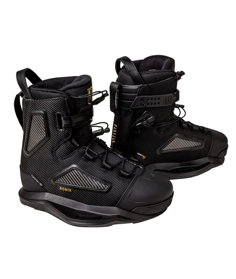 A pair of black Wakeboard Boots with gold branding details, displayed against a solid white background.