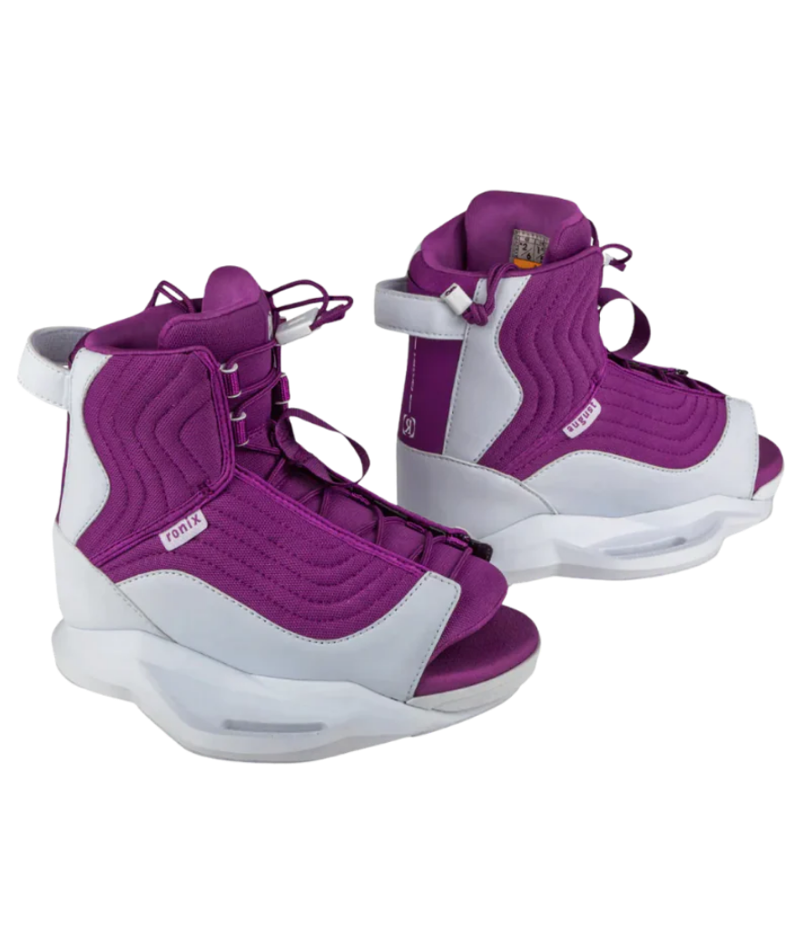 A pair of high-top athletic shoes in purple and white, shown from a three-quarters angle against a plain white background.